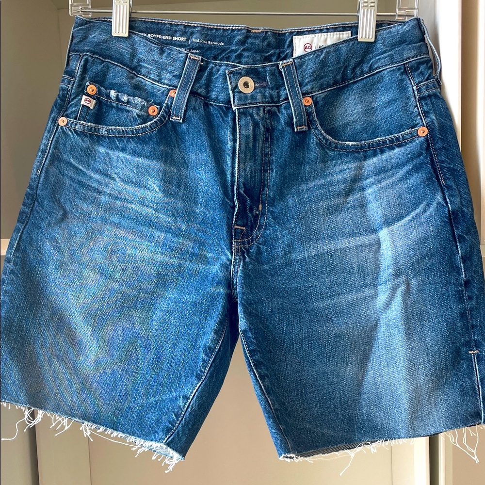 AG Adriano Goldschmied Ex-Boyfriend Mid-Rise Bermuda Short. Slit on side seam.